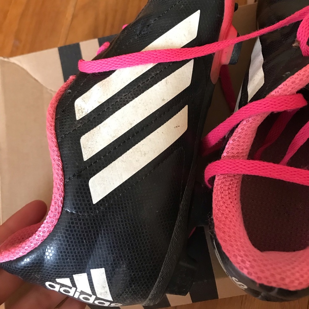 Female soccer pink cleats